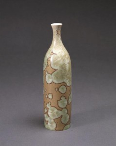 Taxile Doat, who came to University City directly from the Sevres factory in France, had literally written the book – ‘Grand Feu Ceramics’ – on porcelain manufacture. Among his works now in the collection of the St. Louis Art Museum is this variation on a traditional Japanese sake bottle covered with a crystalline glaze. St. Louis Art Museum image